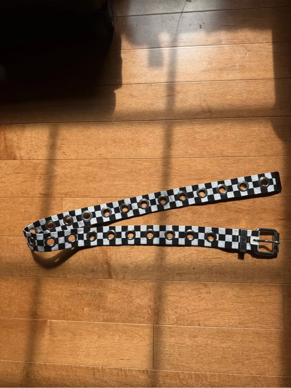 Urban Outfitters Black and White Checkered Grommet Belt